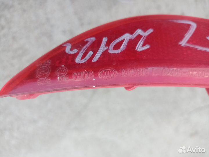 Отражатель в бампер задний левый KIA RIO хэч 2012г