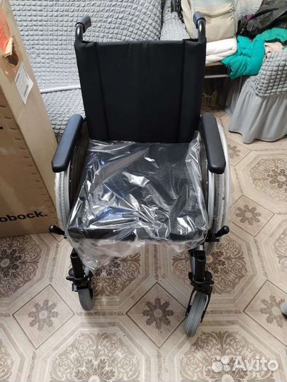 Инвалидная коляска новая