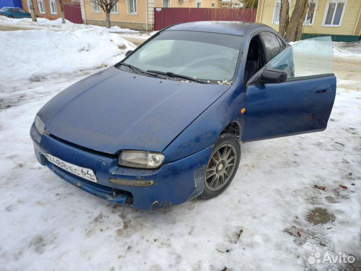 Mazda 323f Мазда двери