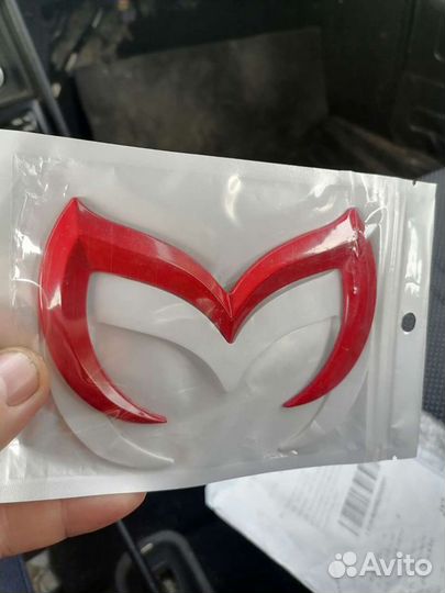 Эмблема mazda