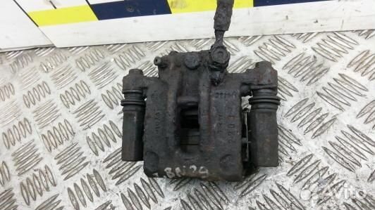 Суппорт тормозной задний правый toyota corolla E12