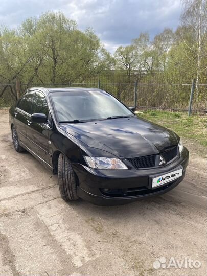Mitsubishi Lancer 1.6 AT, 2009, 320 000 км
