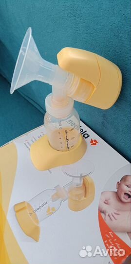 Молокоотсос medela электрический