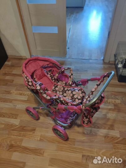Детская игрушечная коляска