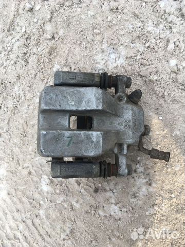 Суппорт тормозной левый задний Toyota Rav4 кузов A