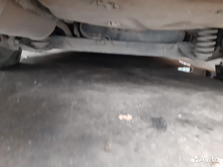 Задняя балка Рено Логан