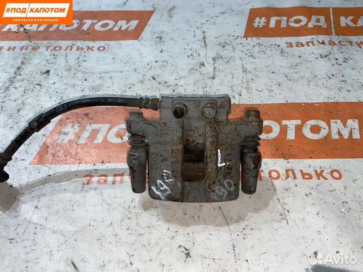 Суппорт тормозной задний левый Mitsubishi 2