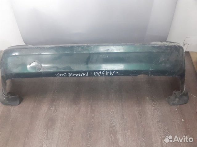 Бампер задний Mazda Familia