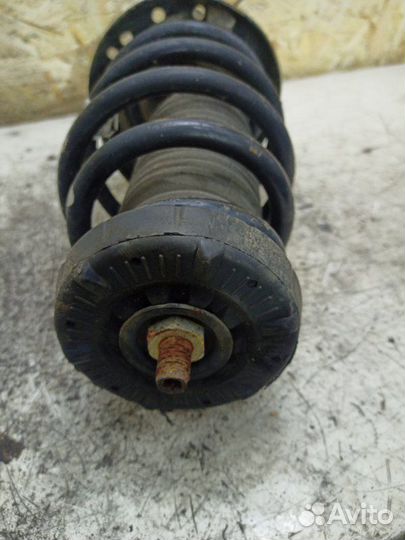 Стойка подвески передняя левая Opel Astra J