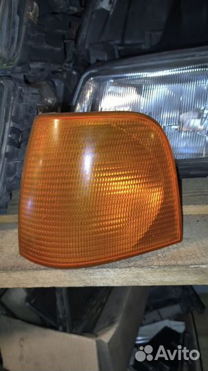 Поворотник Hella передний левый Audi 100c3