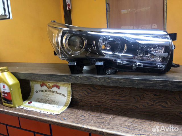 Передняя фара Toyota Corolla 180
