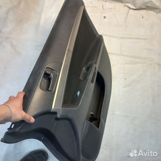 Обшивка двери передняя правая Mitsubichi Lancer 10