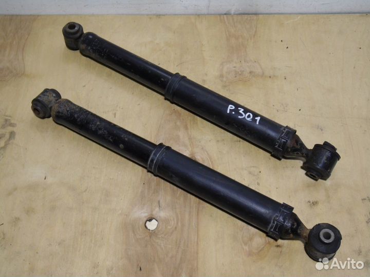 Задний амортизатор Пежо 301 2013-н.в