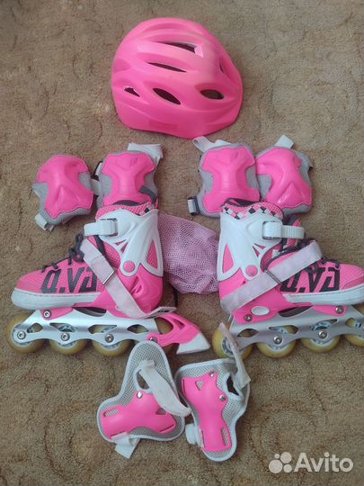 Роликовые коньки