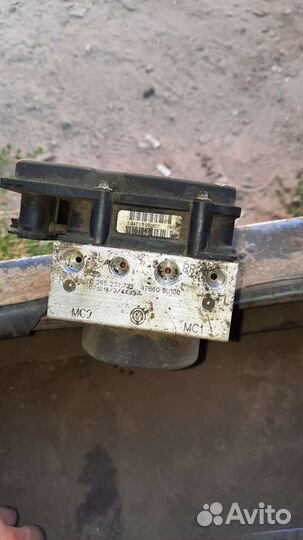 Блок абс (насос) Nissan Note E11