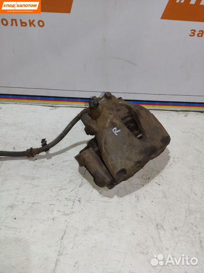 Суппорт тормозной передний правый Opel Astra H