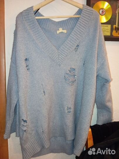 Свитер рваный