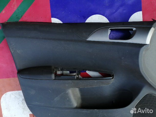 Обшивка двери Subaru Impreza