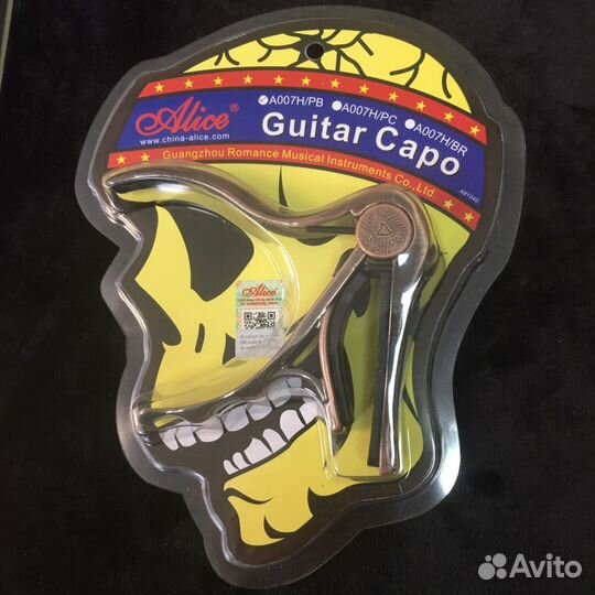 Каподастр для гитары 