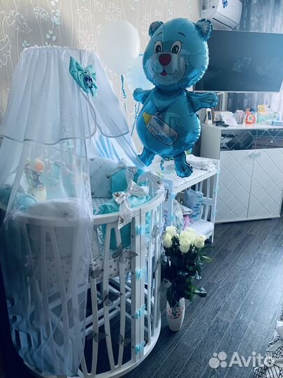 Детская кроватка с маятником