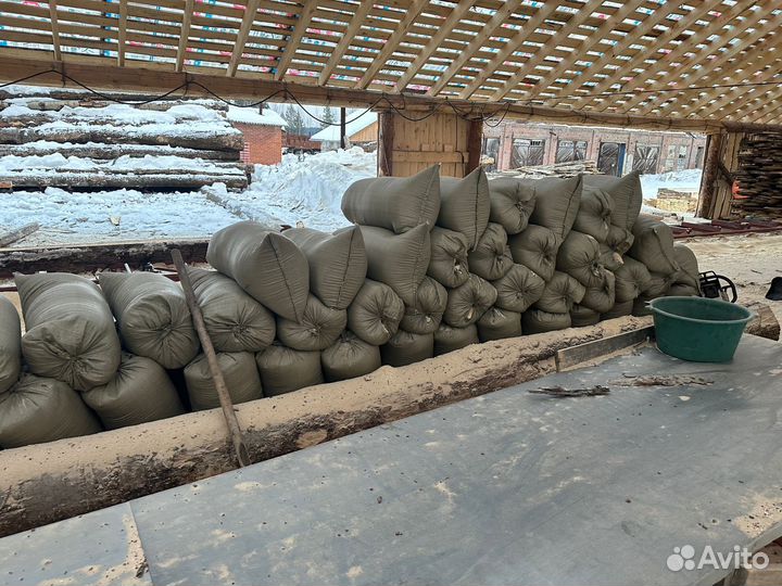 Опилки в мешках