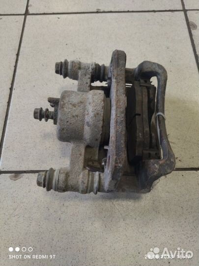 Суппорт тормозной передний правый Kia Picanto 1