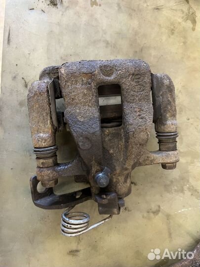 Суппорт тормозной задний kia rio 3