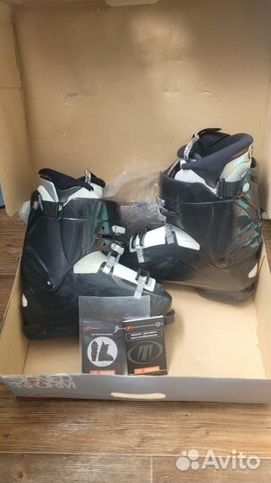 Горные лыжи и ботинки