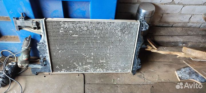 Радиатор на opel астра j gtc