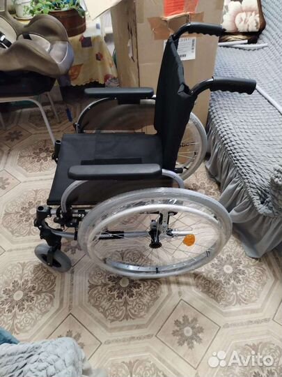 Инвалидная коляска новая