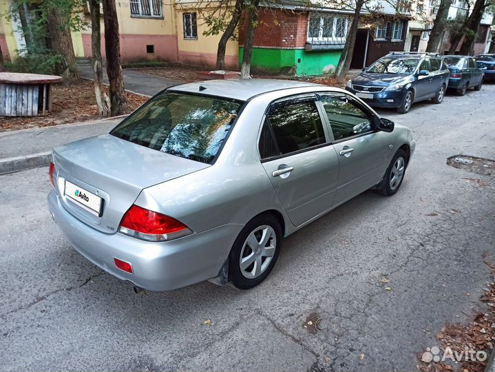 Mitsubishi Lancer 1.6 МТ, 2004, 189 000 км