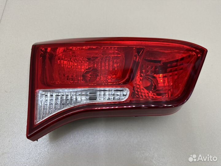Фонарь в крышку багажника левый Kia Rio 3