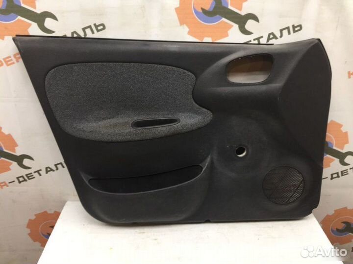 Обшивка двери передняя левая Chevrolet Lanos