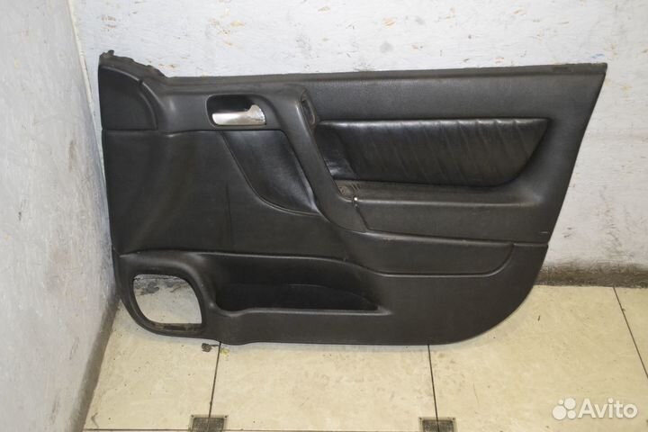 Обшивка двери передняя правая Opel Astra G