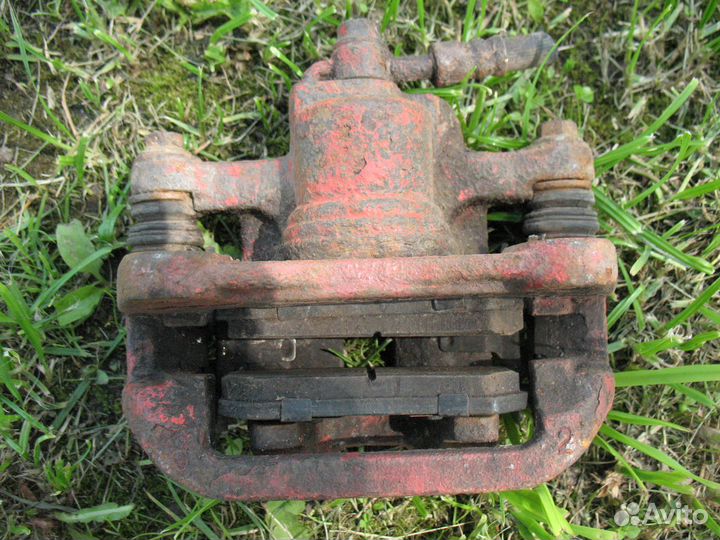 Суппорт передний/задний Chevrolet Lacetti