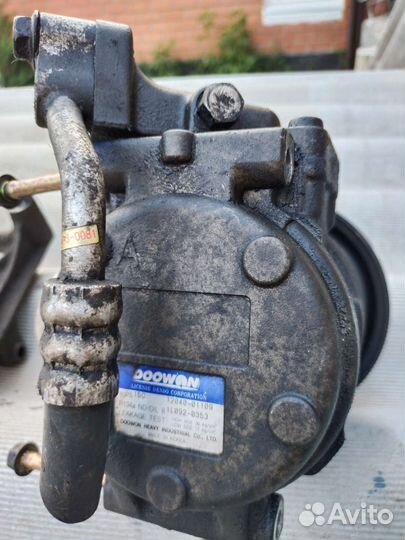 Компрессор кондиционера на Киа spectra