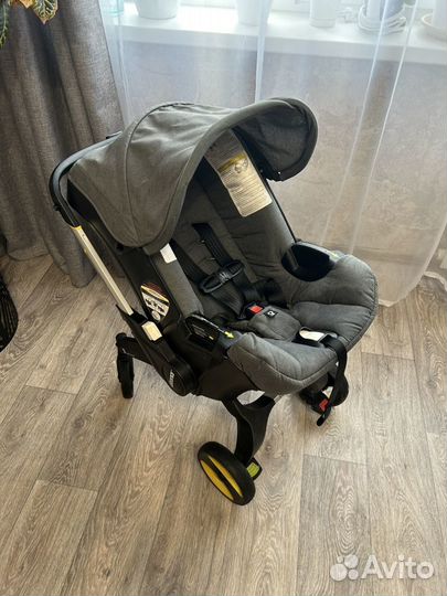 Коляска автокресло Doona с базой isofix