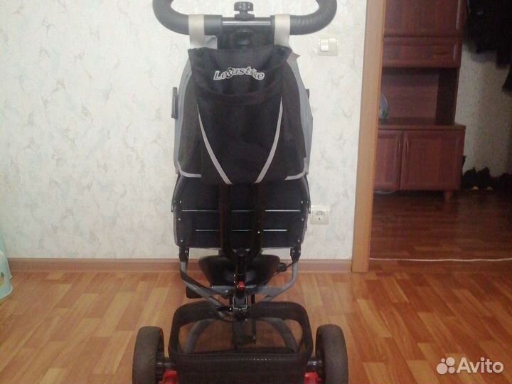 Трехколесный велосипед с ручкой