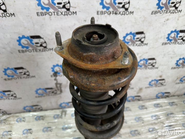 Амортизатор передний левый Mazda 323 Fba hatchback