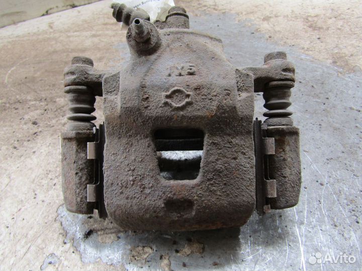 Суппорт передний Лев. Ниссан Sunny 1992г 2л 55кВт