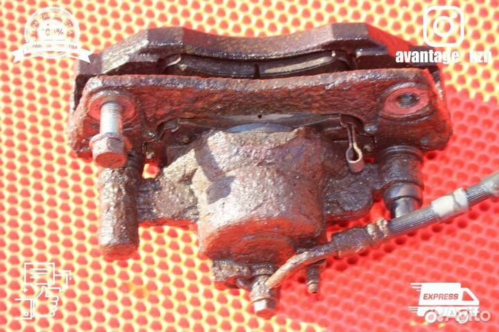 Суппорт тормозной передний левый Mazda 6 GG