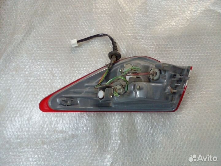 Левый фонарь в крыло Nissan Almera G15 с дефектом