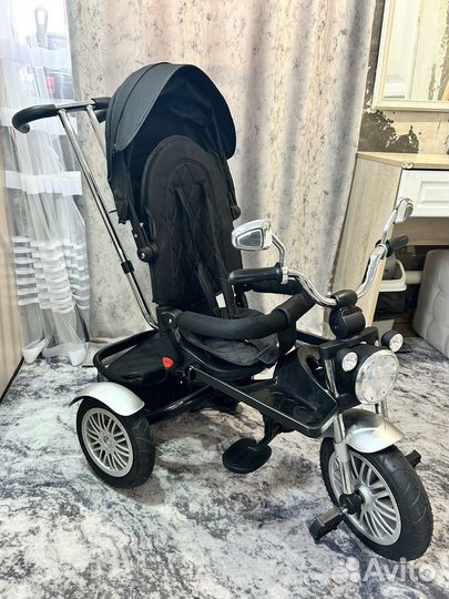 Трехколесный велосипед-коляска luxmom