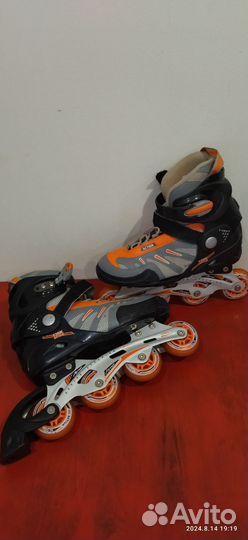 Роликовые коньки