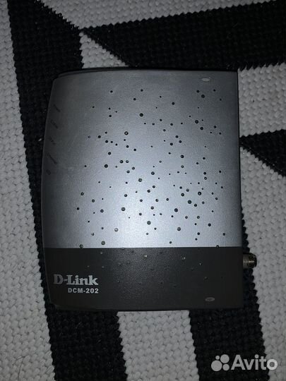 Кабельный модем / роутер D-link DCM-202