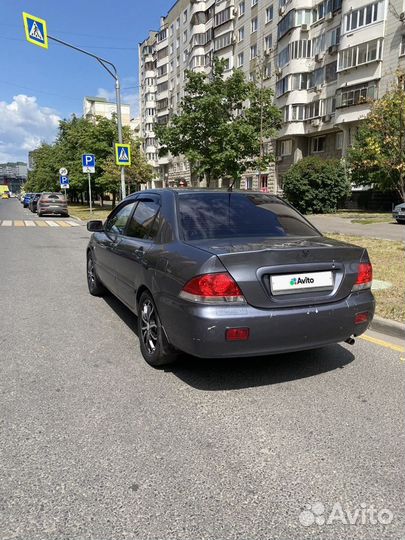 Mitsubishi Lancer 1.6 МТ, 2006, 200 000 км