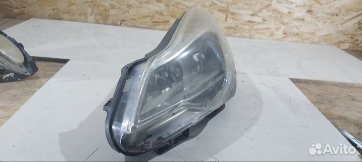 Фара галогеновая передняя левая Opel Corsa D