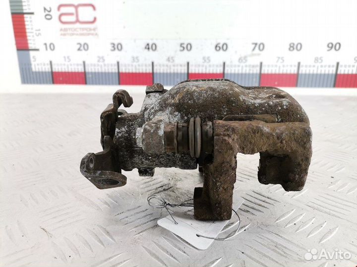 Суппорт задний правый для Opel Zafira A 93177448