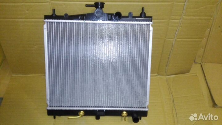 Радиатор двс nissan march K12