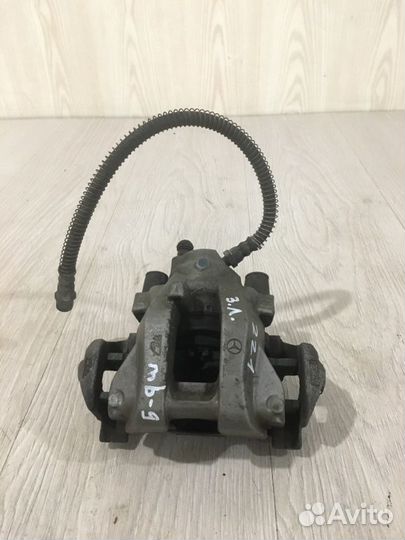 Суппорт тормозной задний левый Mercedes Benz S550